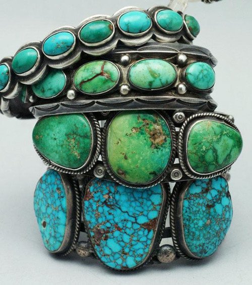 Stack of turquoise and antique silver bracelets