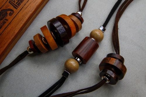 Wooden-beaded jewelry on leather strings